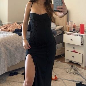 Elegant Black Midi Dress with Floral Details